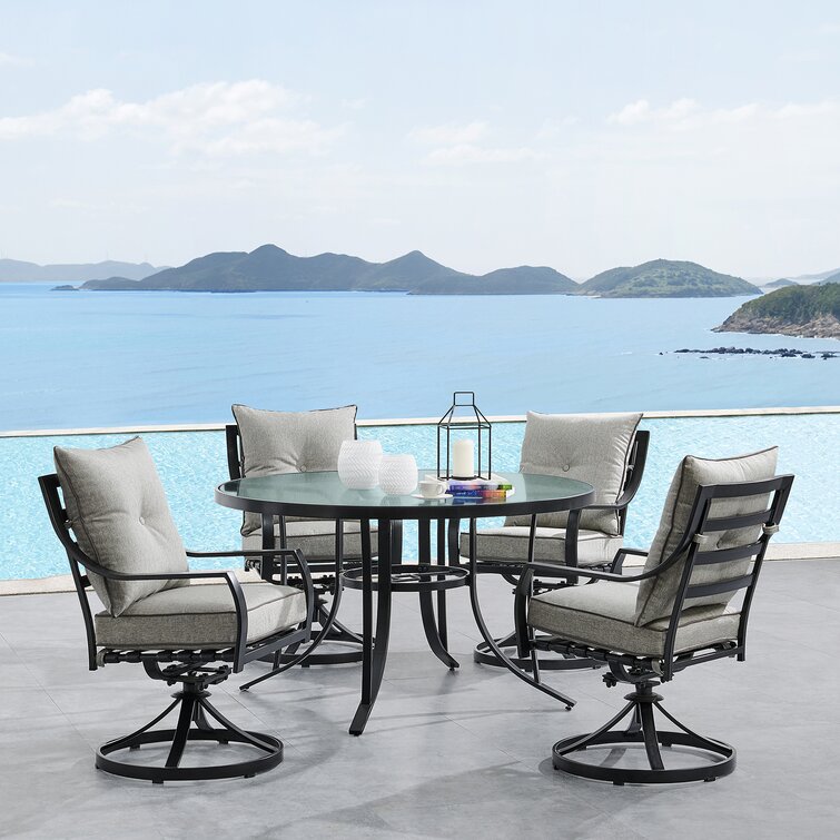 Round patio table with on sale 6 swivel chairs